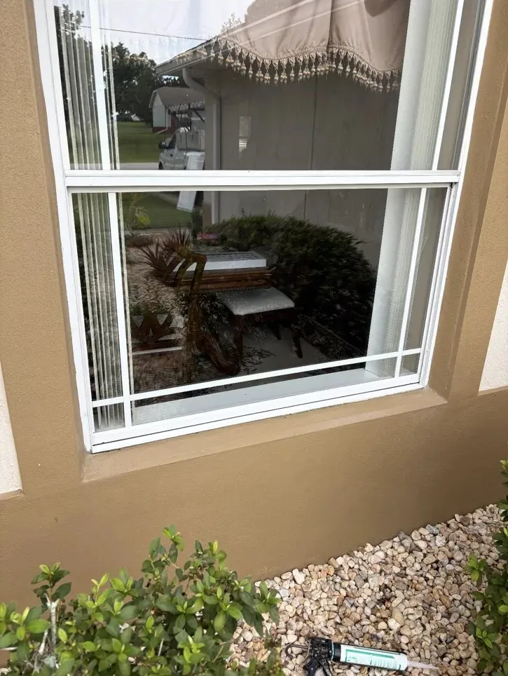Window with clear new glass after a foggy glass unit was replaced